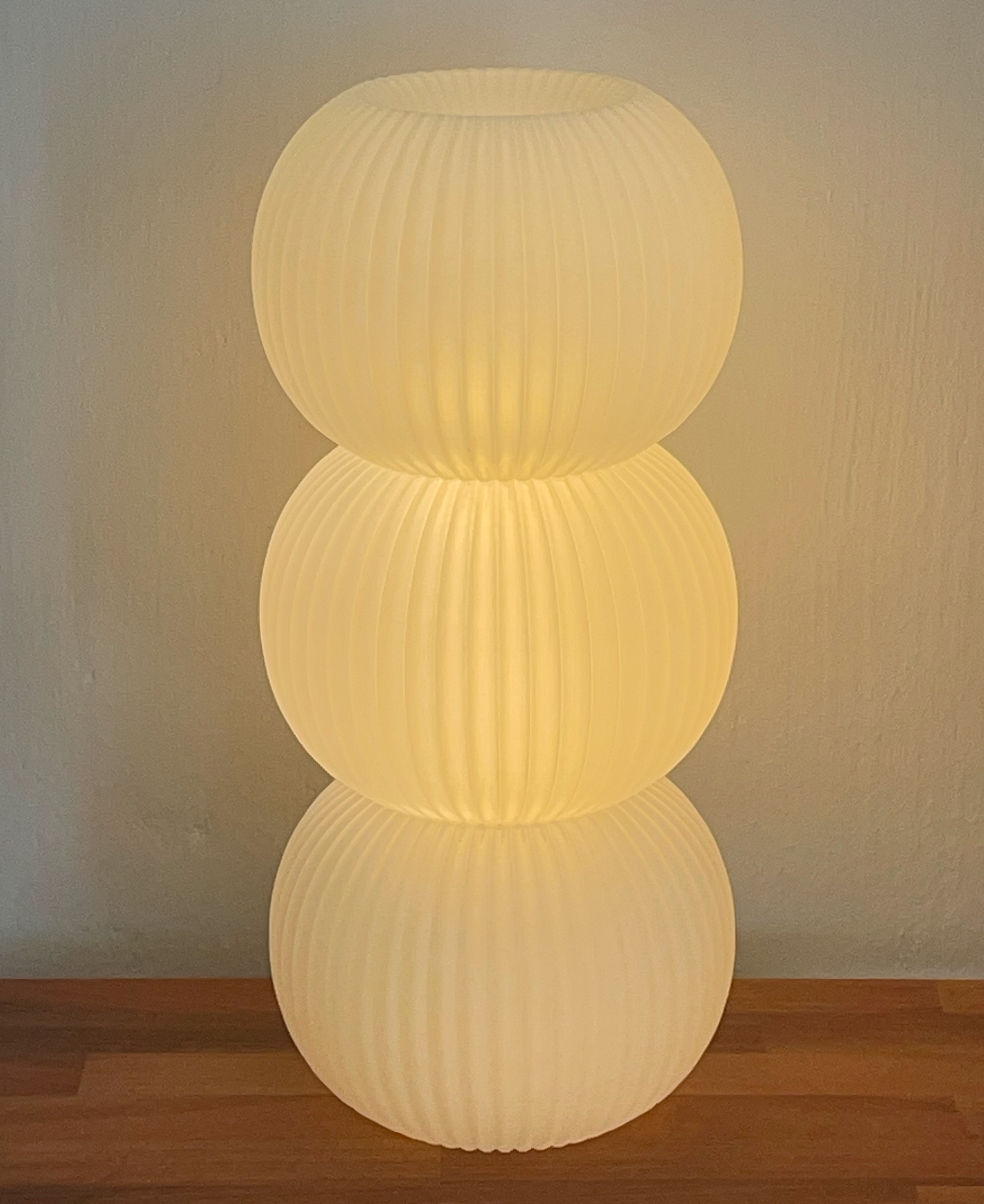 White Dango inspired lamp on a wooden desk